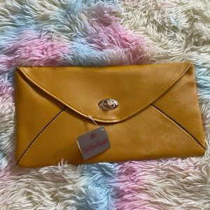 NWT vegan leather clutch